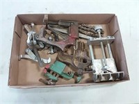 assortment of pullers and vises