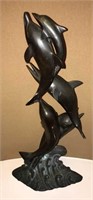 Metal Sculpture of Jumping Dolphins