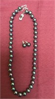Black pearl necklace and earrings