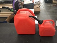 Two plastic gas canisters