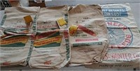 4 feed bags including Dekalb and Pioneer