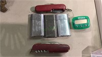 3 Ronson  propane lighters, 2 Swiss Army knives,