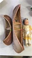 Two birchwood canoes with 1 American Indian doll