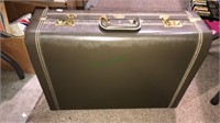 Vacation or royal luggage suitcase with the keys,