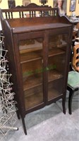 Antique oak display cabinet with two doors with