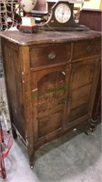Antique chest with two drawers over to doors with