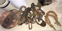 Group of antique pulleys, hooks, Horseshoe, chain