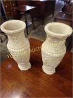 Two Carved Stone Mantle Urns