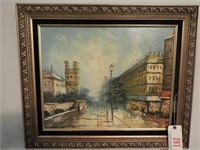 Framed oil on canvas of street scene signed