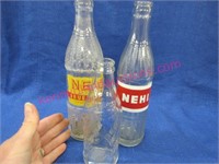 2 nehi bottles & 1 small pepsi bottle