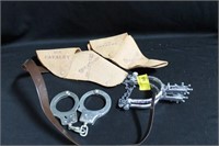 PAIR TOY WESTERN SPURS, HOLSTER AND HAND CUFFS