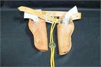 HOLSTER WITH 2 CAP GUNS AND 2 BOLO TIES