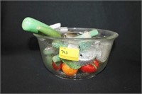 GLASS BOWL WITH VINTAGE COOKIE CUTTERS AND
