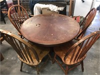 Round table and four chairs

Scratches etc on