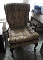 Upholstered wingback chair