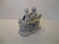 Blue and White Man and Women Figurine