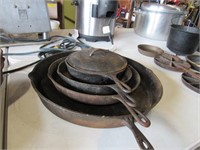 Four Used Cast Iron Skillets, Up to 20"