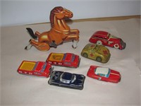 Tin toy cars and wind up horse