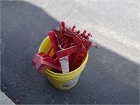 Bucket full of 10" Adjustable Roofing Brackets