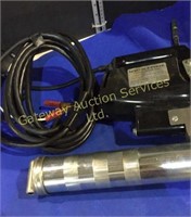 Electric grease gun and assorted hoses in a box