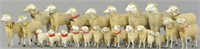 GROUPING OF TWENTY-FOUR WOOLY SHEEP