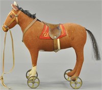 FELT HORSE W/LEATHER SADDLE ON WHEELS