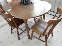 Maple dining table and four chairs