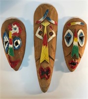 GROUPING OF 3 TRIBAL PRIMITIVE WOOD MASKS