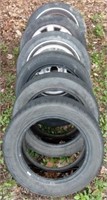 (2) Misc tires with steel wheels, (2) misc tires