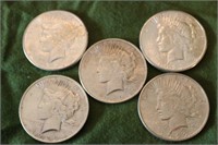 Five Silver Dollars
