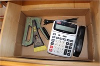 Calculator, stapler, pens
