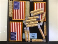 TRAY OF GOLD PLATED FLAKES & AMERICAN FLAG PATCHS