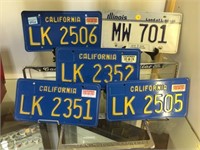 COLLECTION OF LICENSE PLATES & HOLDERS