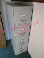 older heavy 4-drawer file cabinet
