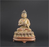Chinese Qing carved gilt wood Buddha