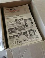 Box full of Hawkeye Racing News magazines