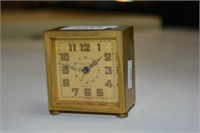 Vintage gilt brass cased miniature alarm clock,