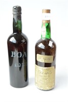 2 bottles: a bottle of Boal Madeira 1933,
