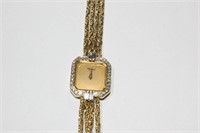 Ladies chopard 18ct gold & diamond wrist watch,