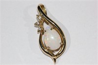 18ct yellow gold, solid white, opal & diamond