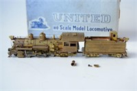 United HO gauge model locomotive and tender,