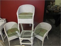 Wicker table w. 3 needlepoint chairs