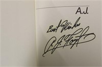 GROUP OF (7) BOOKS: A.J. FOYT- SIGNED A.J. FOYT,