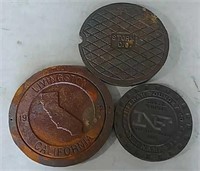 3 cast iron storm drain covers