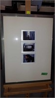 Three framed Polaroid prints