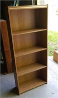 4 tier book shelf approx 24 inches wide and 5