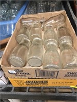 assorted milk bottles kinds and sizes
