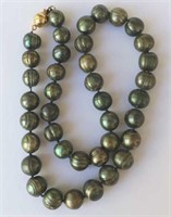 Tahitian dark green circle pearl necklace