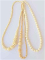 Three various antique ivory necklaces