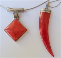 Two sterling silver coral pendants